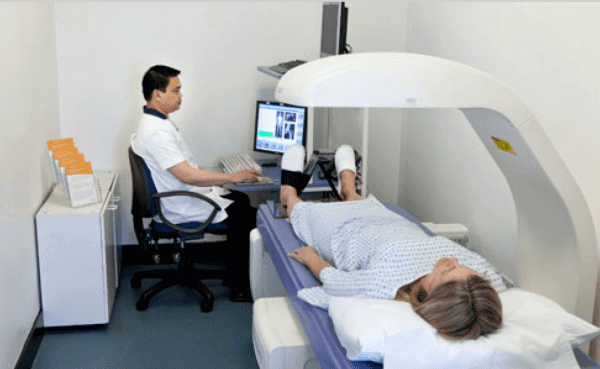 woman getting DXA test
